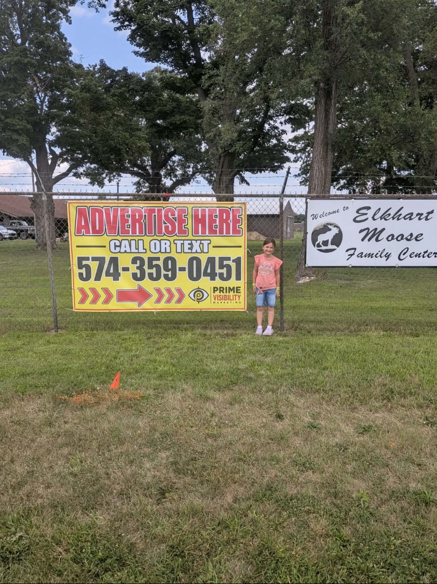 Yellow Advertise Here banner with the Prime Visibility Marketing logo at the Elkhart Moose Family Center